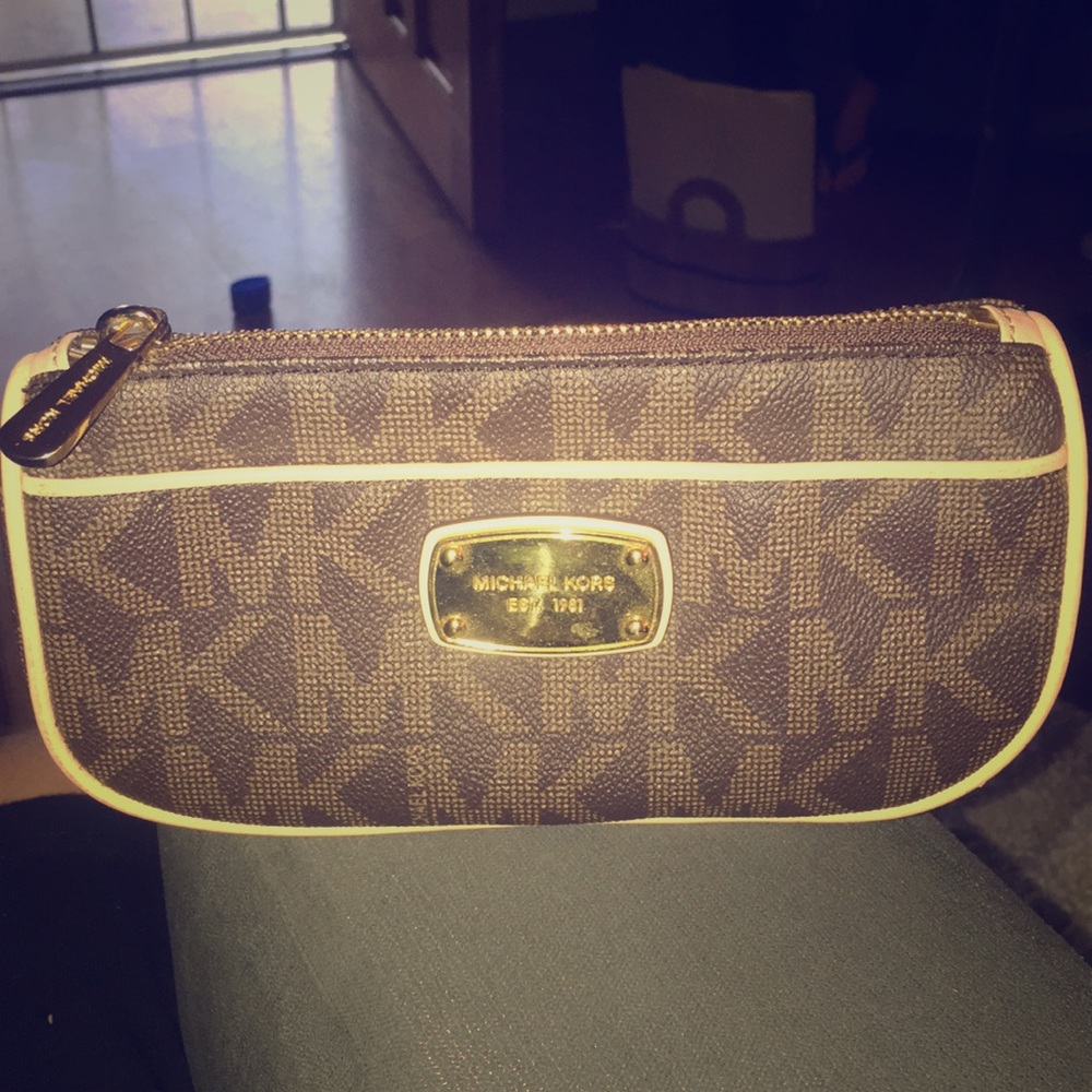 Michael Kors makeup clutch. Brown in color